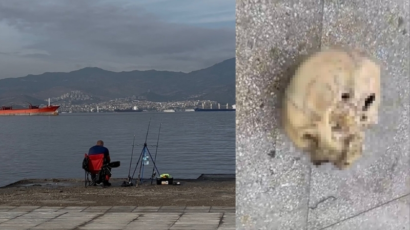 İzmir'in Konak ilçesinde balık tutan bir balıkçının oltasına insana ait